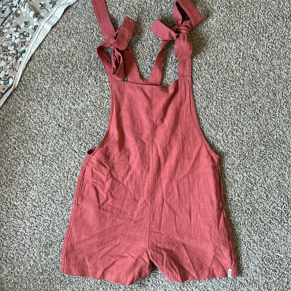 Red overalls never worn!